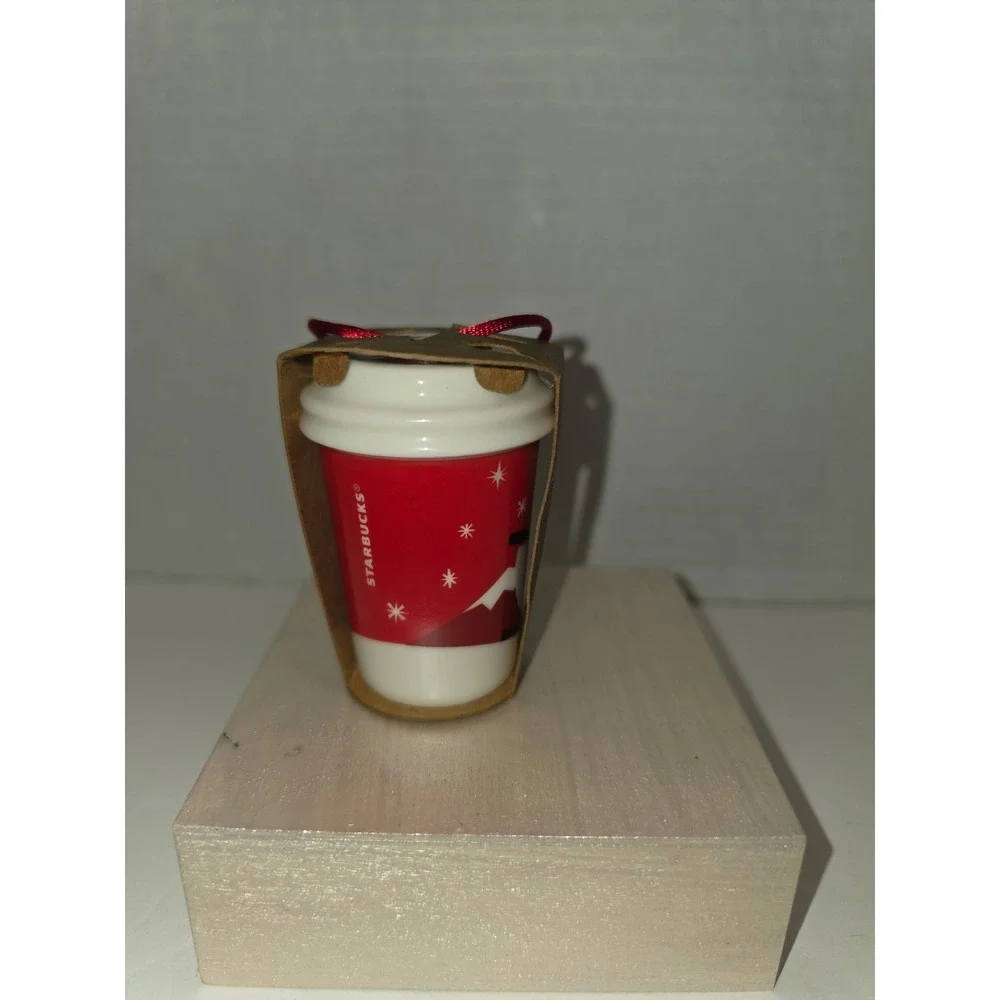 2011 Starbucks Ceramic Holiday To-Go Cup ornament dog and‎ boy on a sled